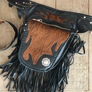 Genuine Leather and rawhide western belt purse.